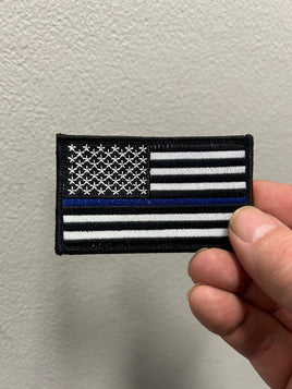 American flag with blue line patch